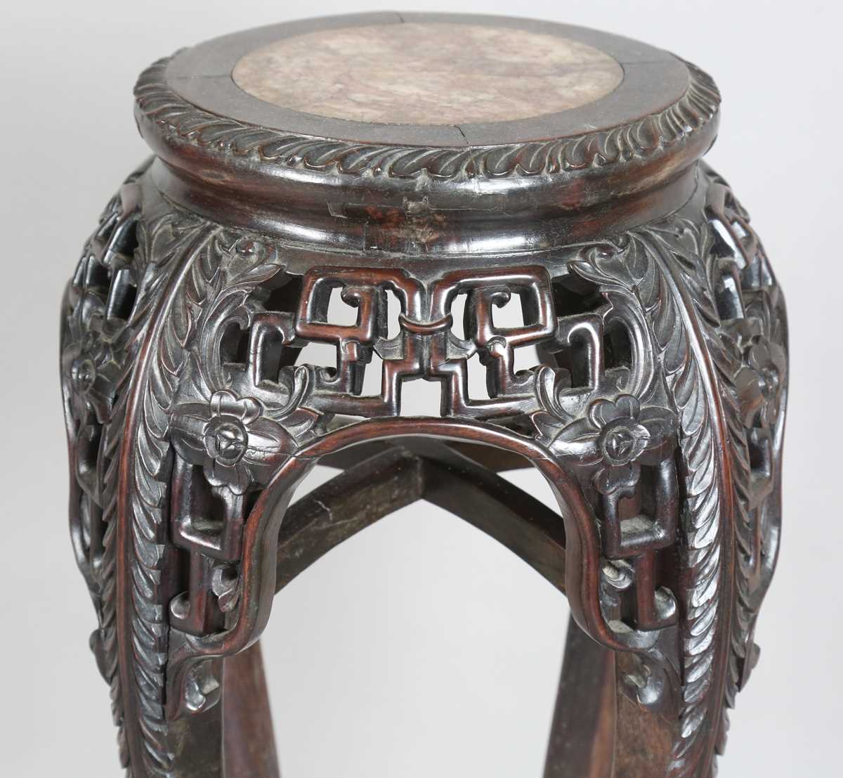 A Chinese hardwood jardinière stand, late 19th century, the circular top inset with a rouge marble - Image 3 of 17