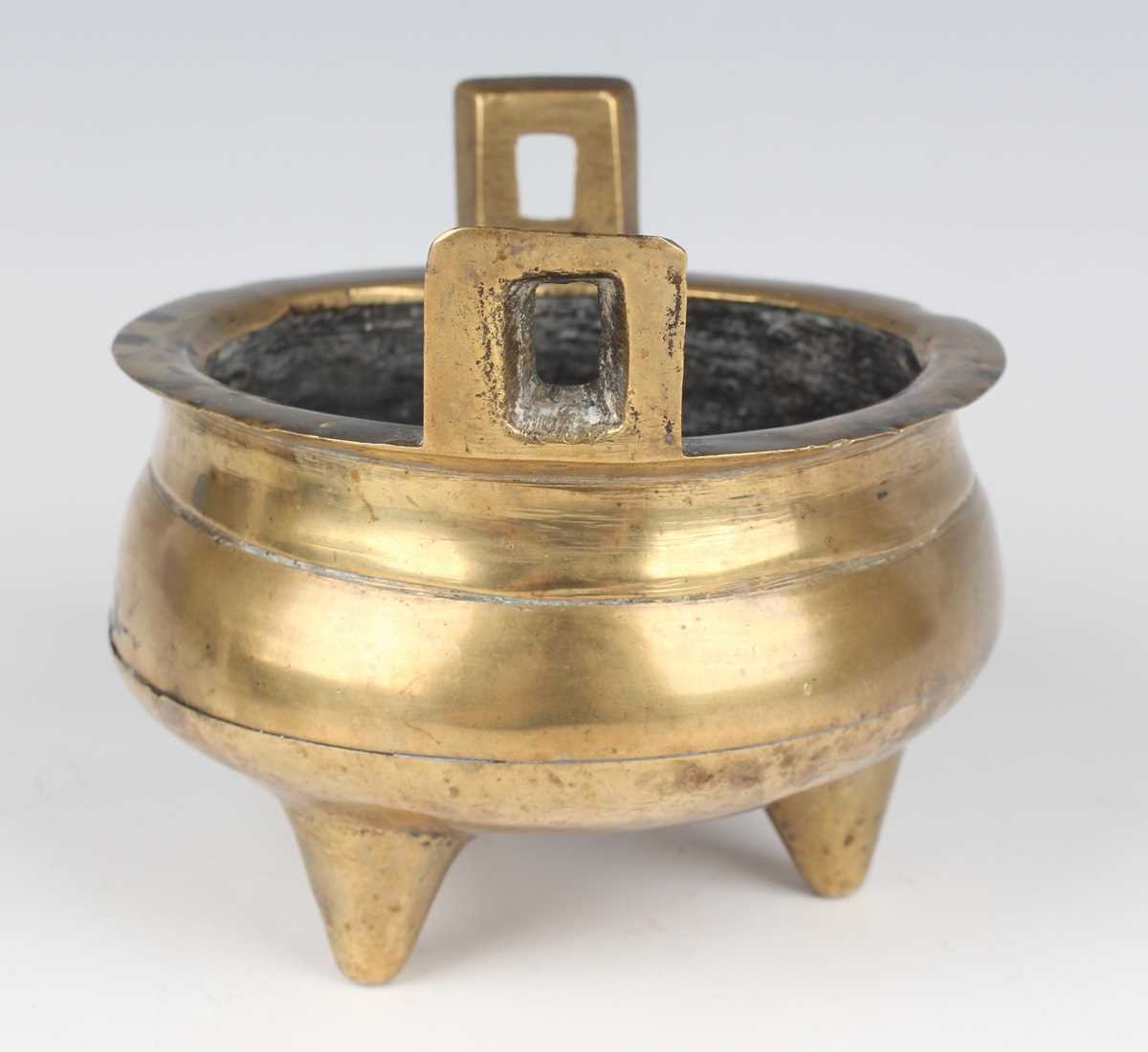 A Chinese brown patinated bronze tripod censer, Qing dynasty, of low-bellied circular form on - Image 10 of 14