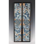 A pair of Chinese silk embroidered rectangular sleeve panels, late 19th century, each worked in