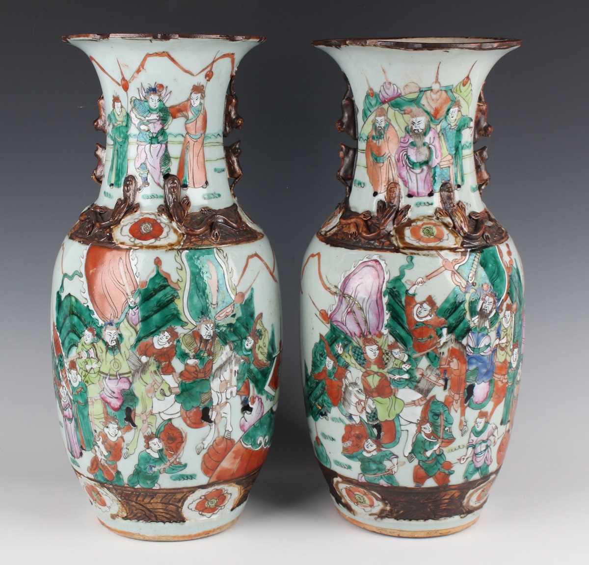 A pair of Chinese famille verte decorated porcelain vases, early 20th century, each ovoid body and