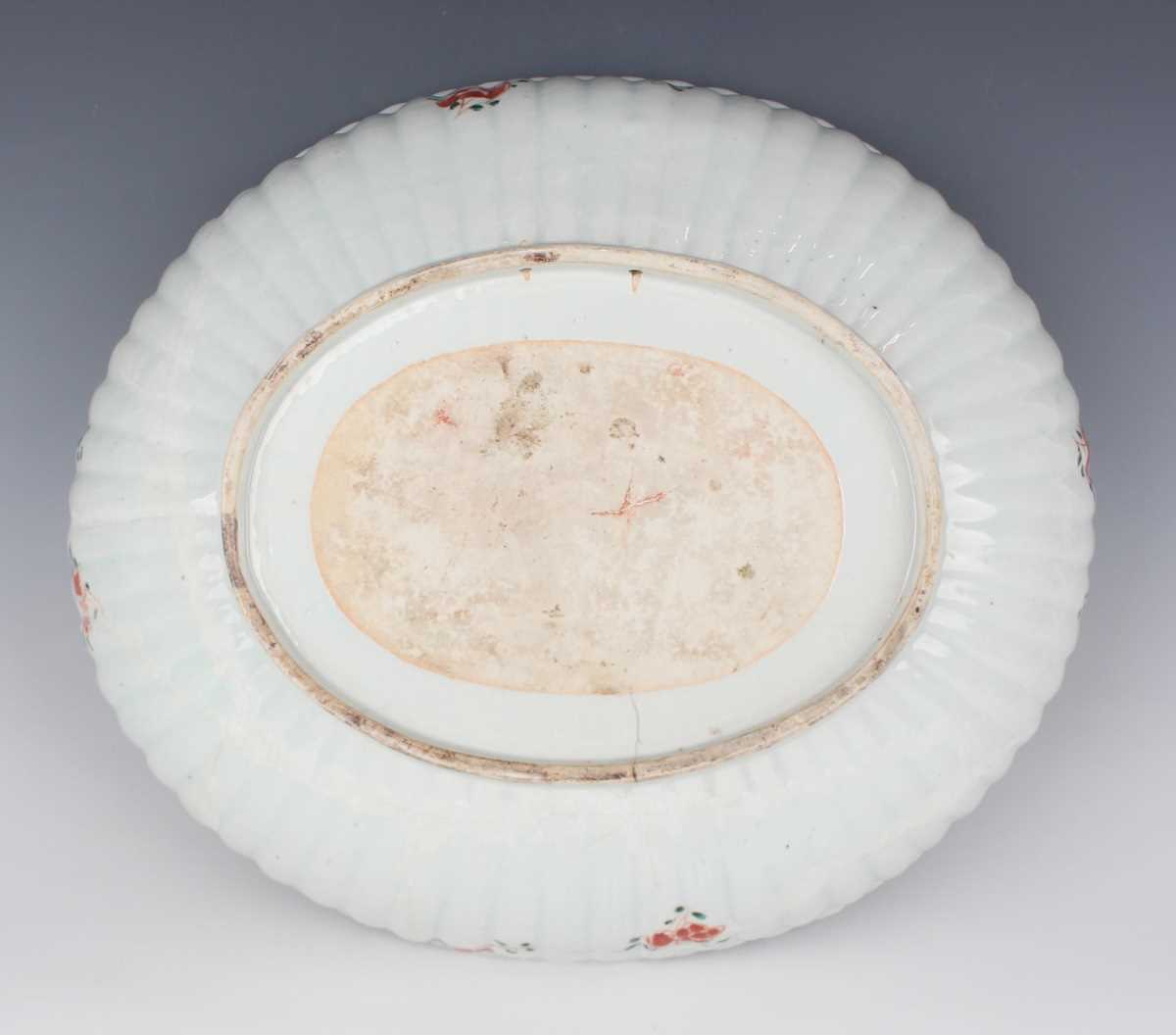 A Chinese famille verte export porcelain bowl, Kangxi period, of fluted oval form, the interior - Image 9 of 20