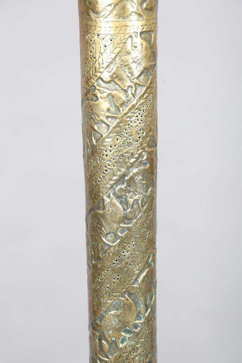 An Islamic brass floor lamp, circa 1900, the flared surmount and cylindrical column decorated with - Image 16 of 24