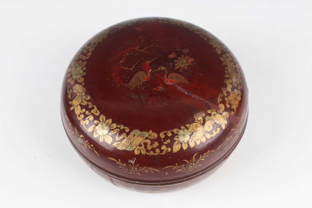 A Chinese red lacquer three-tier box with overhead handle, late 19th/early 20th century, decorated - Image 35 of 46