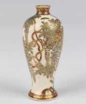 A Japanese Satsuma earthenware miniature vase by Kinkozan, Meiji period, of slender baluster form,