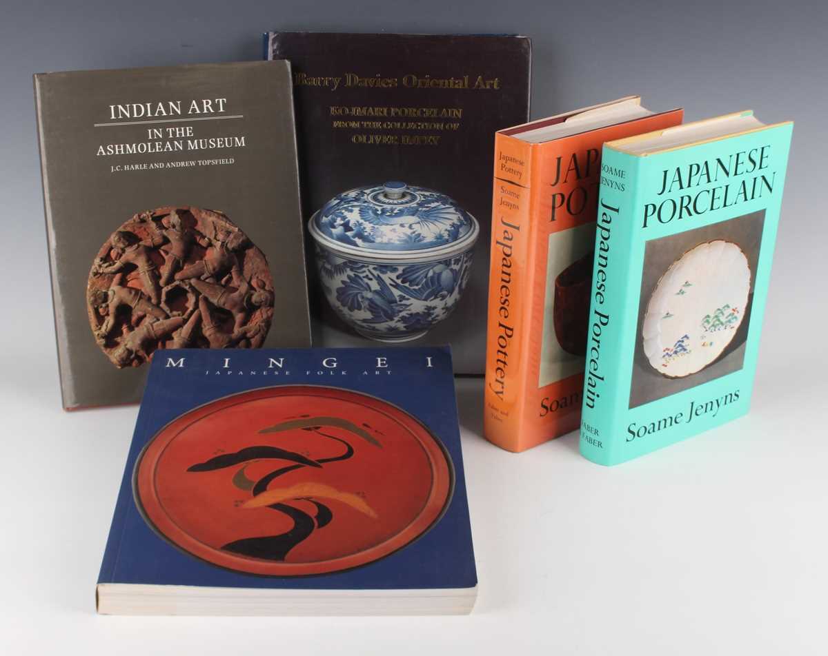 A collection of Asian art reference books, including 'Ko-Imari porcelain from the collection of