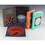 A collection of Asian art reference books, including 'Ko-Imari porcelain from the collection of