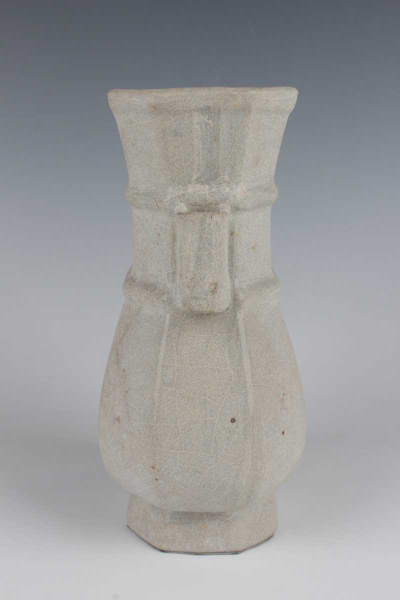 A Chinese Guan-type hu shaped vase, probably Qing dynasty, of octagonal baluster form with tubular - Image 4 of 7