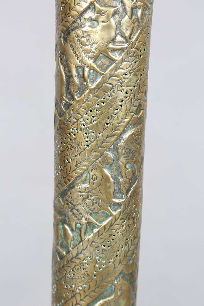 An Islamic brass floor lamp, circa 1900, the flared surmount and cylindrical column decorated with - Image 5 of 24