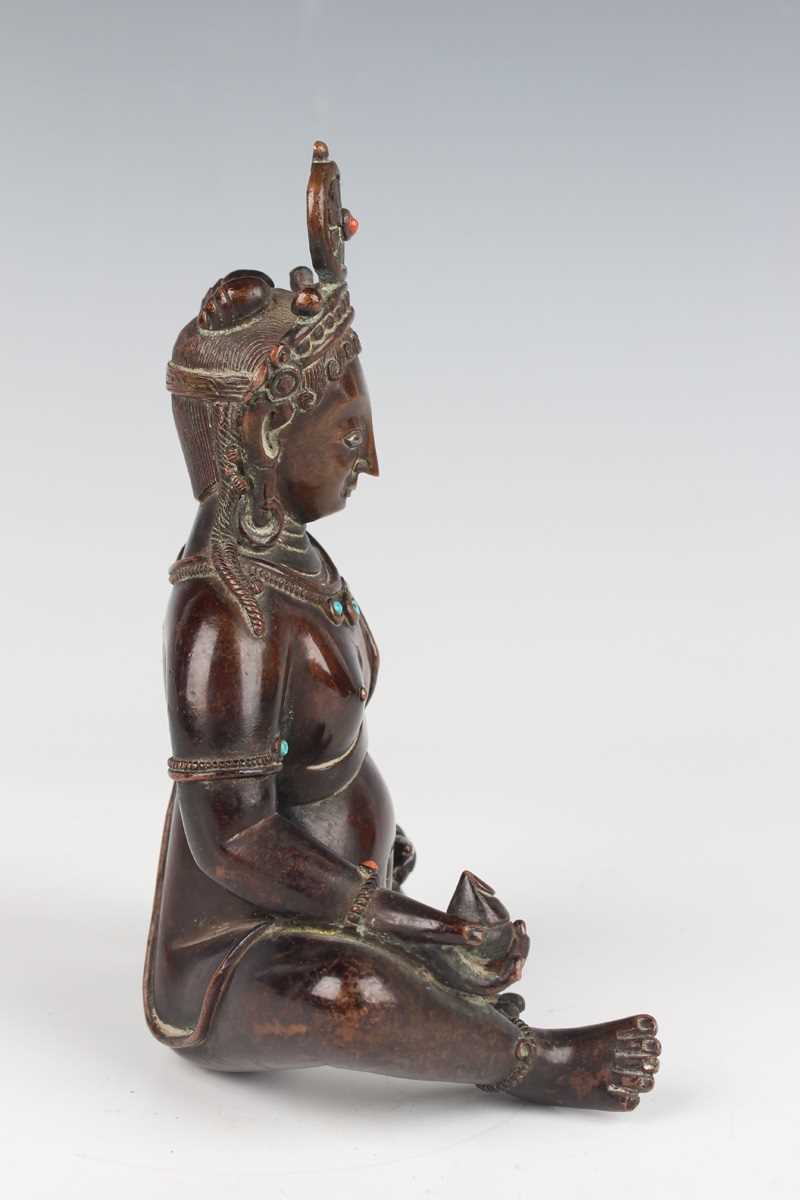 A Sino-Tibetan brown patinated copper alloy/bronze figure of Jambhala, late Qing dynasty, with - Image 5 of 8