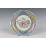 A Chinese famille rose ruby back porcelain saucer dish, Yongzheng style but 20th century or later,