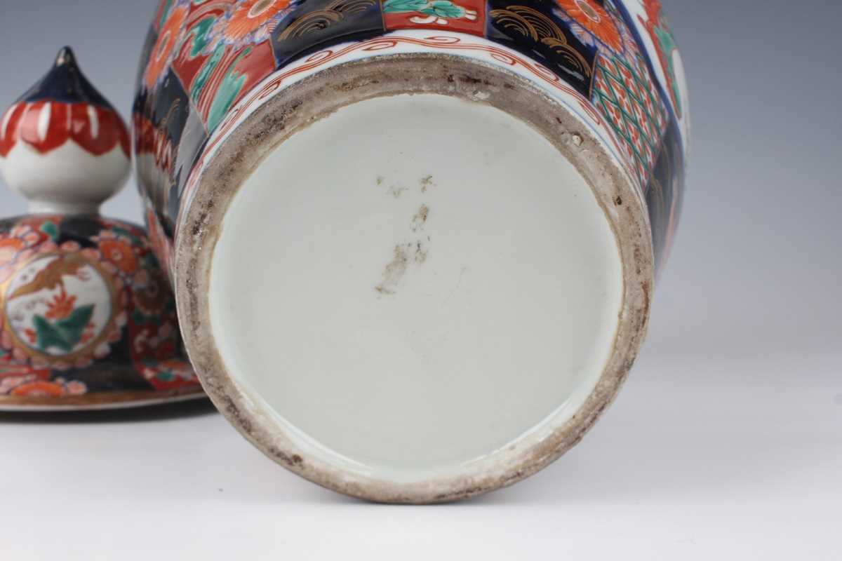 A pair of Japanese Imari porcelain vases and covers, Meiji period, each ovoid body and domed cover - Image 16 of 20