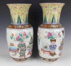 A pair of Chinese famille rose porcelain vases, late 19th century, each swollen cylindrical body