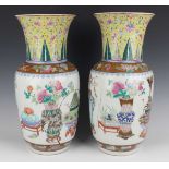 A pair of Chinese famille rose porcelain vases, late 19th century, each swollen cylindrical body