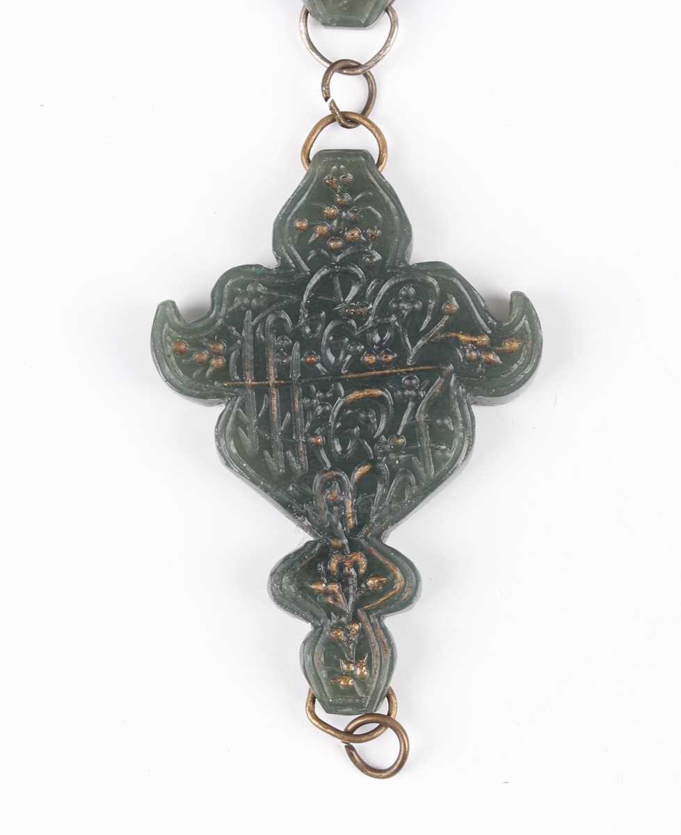 An Islamic dark green jade three-section arm ornament, each piece incised with script, total width - Image 5 of 27