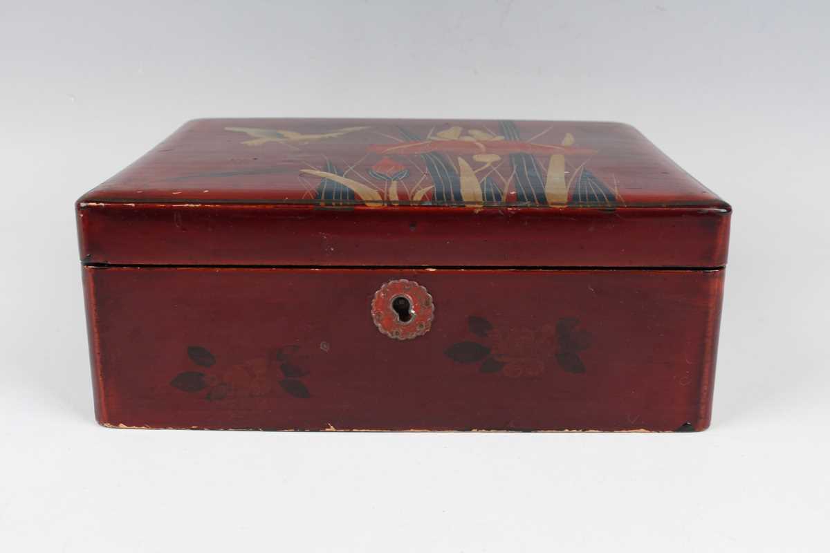 A Chinese red lacquer three-tier box with overhead handle, late 19th/early 20th century, decorated - Image 25 of 46