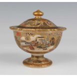 A Japanese Satsuma earthenware circular potpourri jar and cover, attributed to Kozan, Meiji