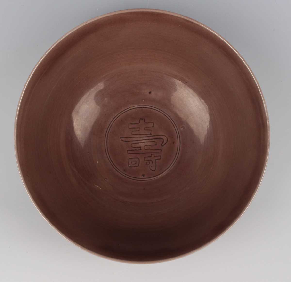 A Chinese aubergine glazed porcelain bowl, mark of Yongzheng but later, of steep-sided circular form