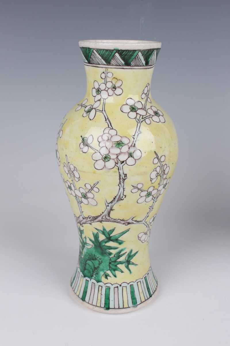 A pair of Chinese yellow ground porcelain vases, late Qing dynasty, of baluster form, decorated with - Image 4 of 33