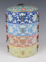 A Chinese famille rose enamelled porcelain four-tier stacking box and cover, late Qing dynasty, of