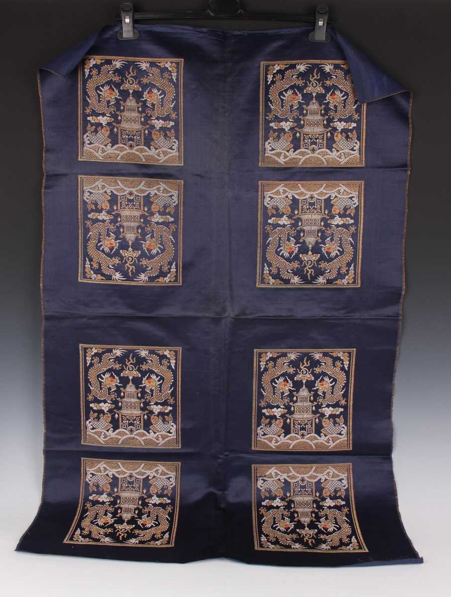 A Chinese blue silk embroidered rectangular panel, 20th century, worked with eight matching rank - Image 20 of 70