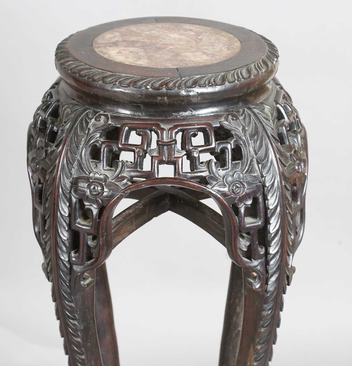 A Chinese hardwood jardinière stand, late 19th century, the circular top inset with a rouge marble - Image 9 of 17