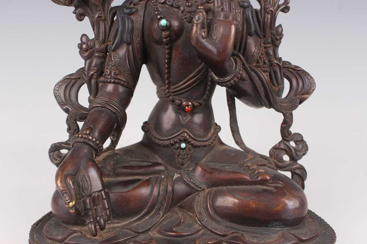 A Sino-Tibetan brown patinated copper alloy figure of Tara, 20th century, modelled seated in - Image 4 of 9