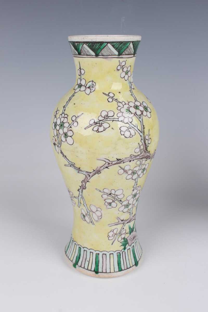 A pair of Chinese yellow ground porcelain vases, late Qing dynasty, of baluster form, decorated with - Image 6 of 33