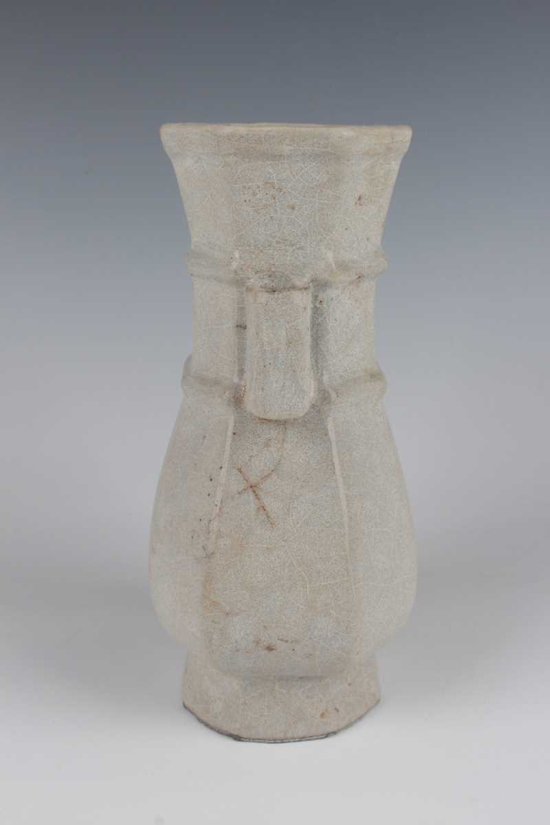 A Chinese Guan-type hu shaped vase, probably Qing dynasty, of octagonal baluster form with tubular - Image 2 of 7