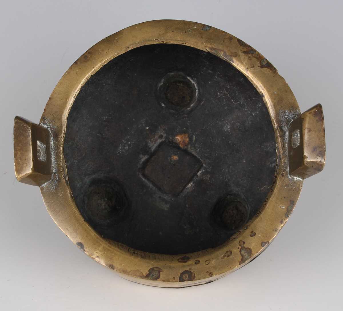 A Chinese brown patinated bronze tripod censer, Qing dynasty, of low-bellied circular form on - Image 13 of 14