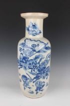 A Chinese blue and white porcelain rouleau vase, late 19th century, painted with a battle scene,