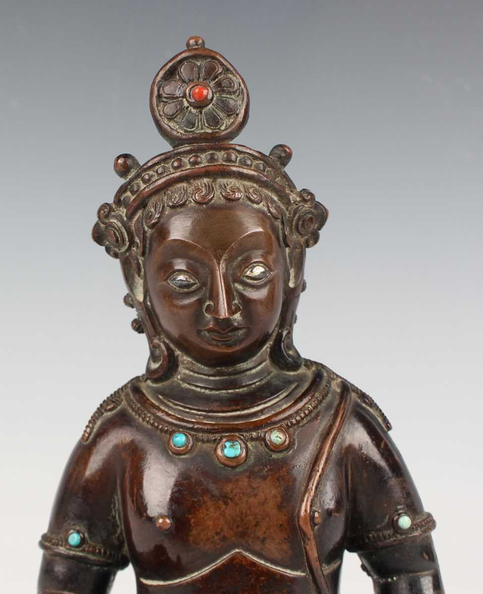 A Sino-Tibetan brown patinated copper alloy/bronze figure of Jambhala, late Qing dynasty, with - Image 2 of 8