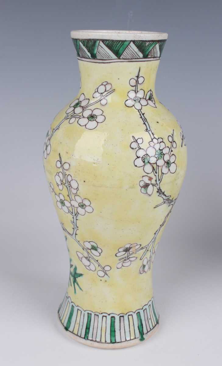 A pair of Chinese yellow ground porcelain vases, late Qing dynasty, of baluster form, decorated with - Image 5 of 33