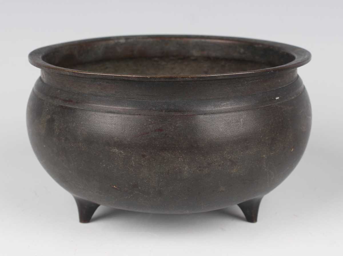 A Chinese brown patinated bronze tripod censer, Qing dynasty, of low-bellied circular form on - Image 2 of 14