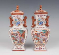 A pair of Chinese famille rose export porcelain vases and covers, late Qianlong period, each of