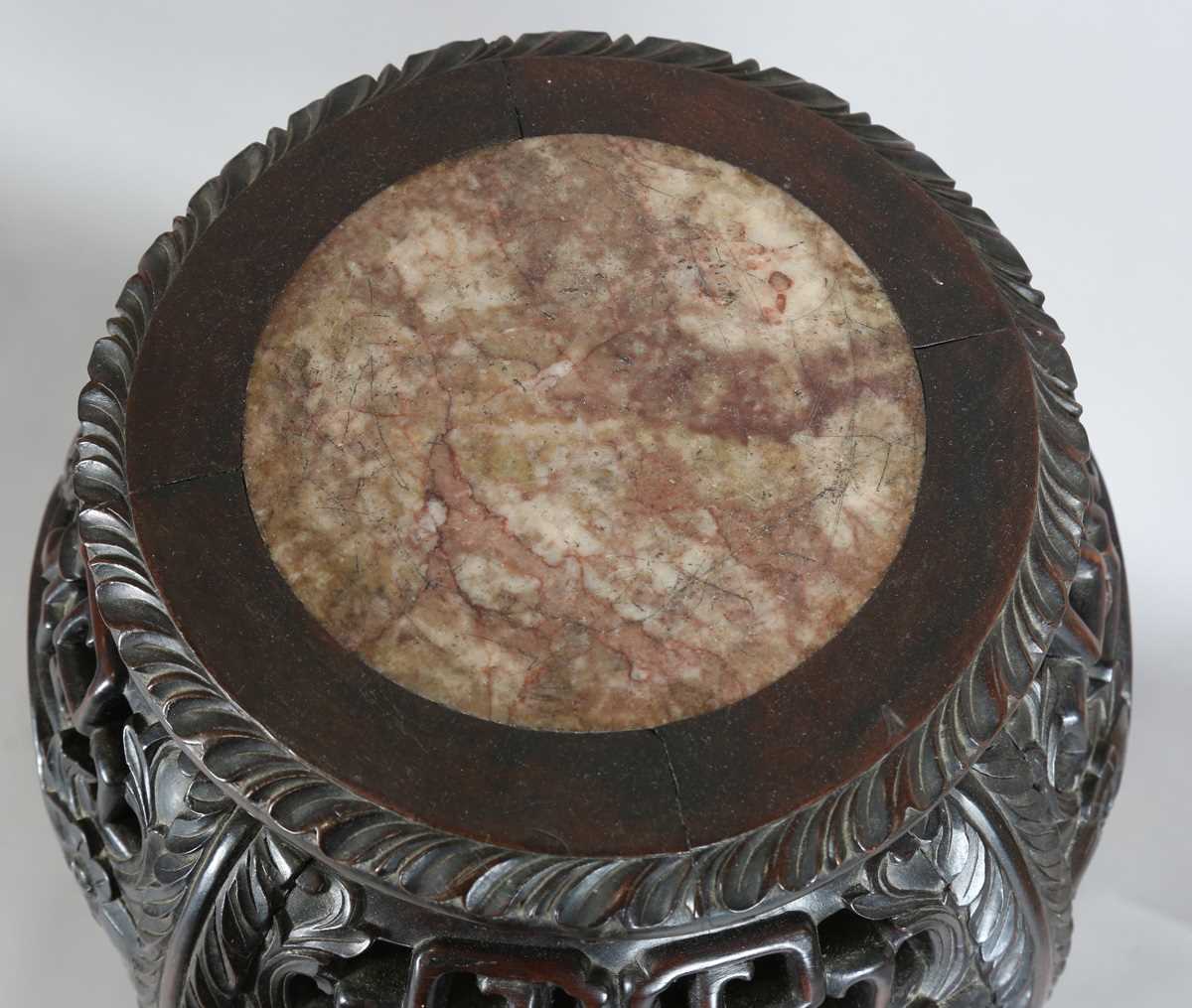 A Chinese hardwood jardinière stand, late 19th century, the circular top inset with a rouge marble - Image 2 of 17