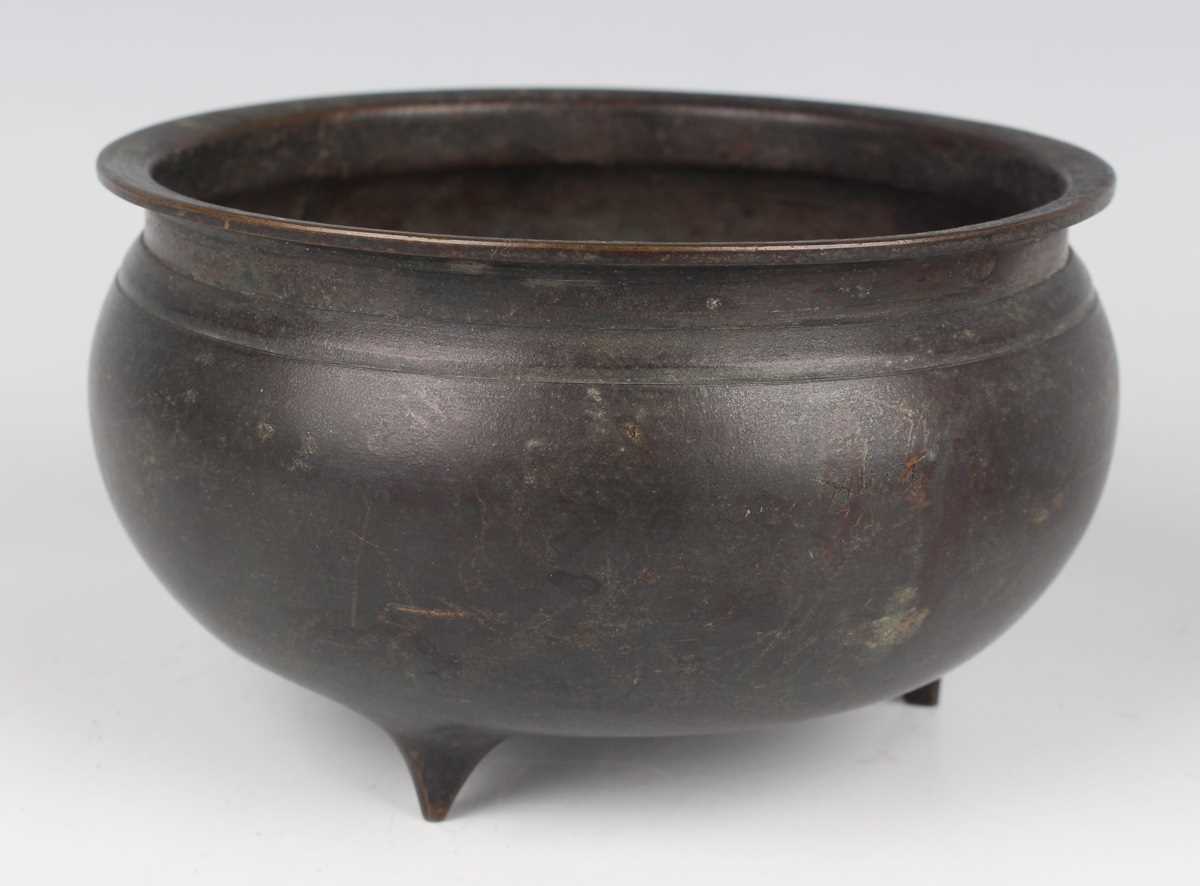 A Chinese brown patinated bronze tripod censer, Qing dynasty, of low-bellied circular form on - Image 4 of 14