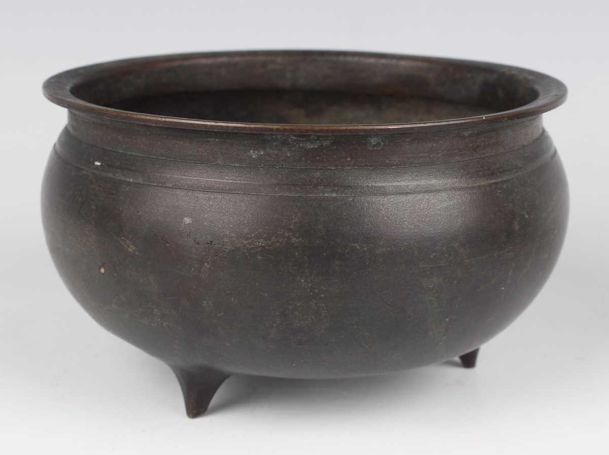 A Chinese brown patinated bronze tripod censer, Qing dynasty, of low-bellied circular form on - Image 3 of 14