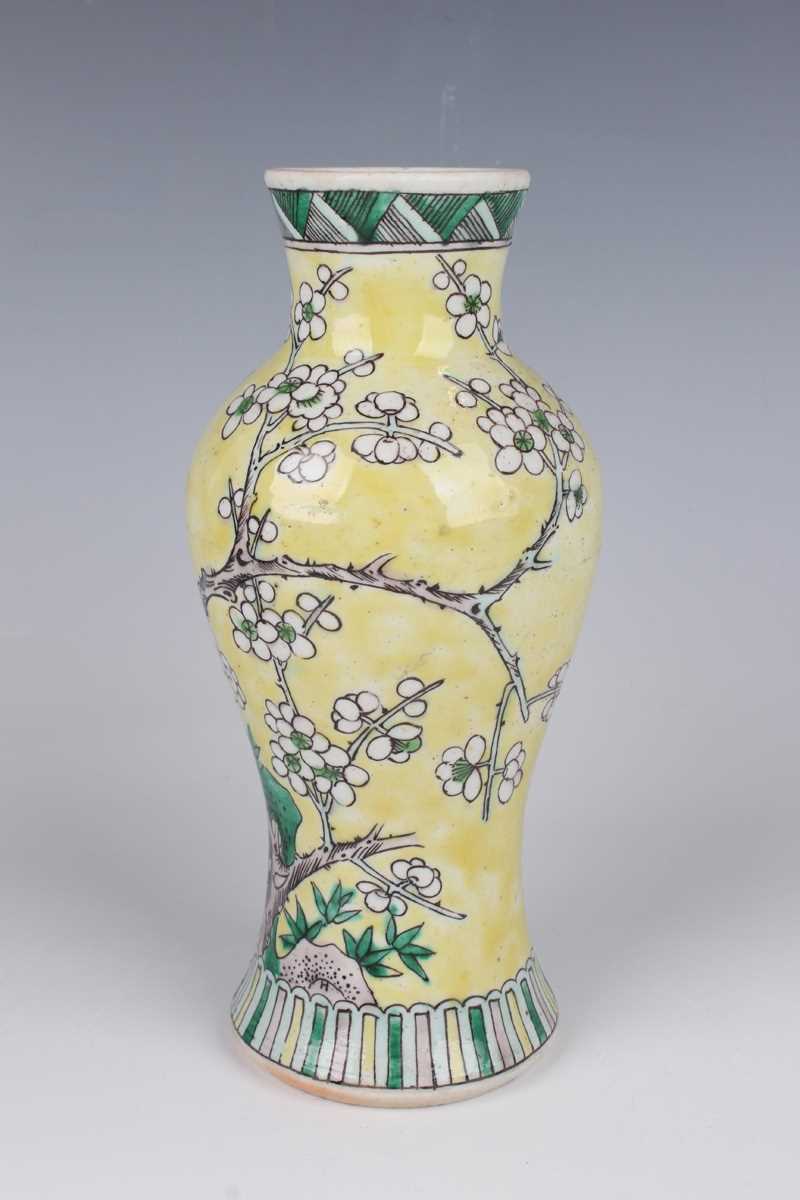 A pair of Chinese yellow ground porcelain vases, late Qing dynasty, of baluster form, decorated with - Image 10 of 33