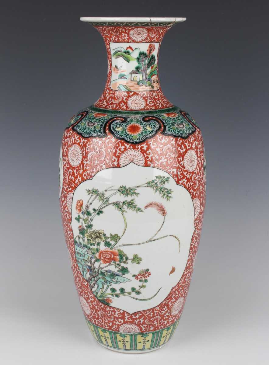 A Chinese famille verte porcelain vase, late Qing dynasty of shouldered tapering form with flared