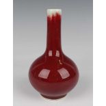 A Chinese sang-de-boeuf glazed porcelain bottle vase, probably 20th century, the globular body