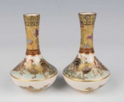 A pair of Japanese Satsuma earthenware diminutive bottle vases by Fujisan, Meiji period, each