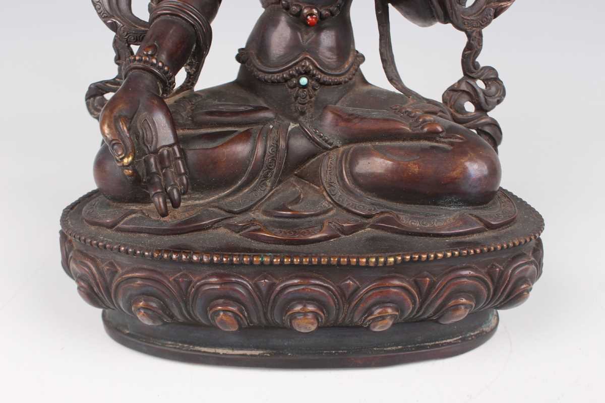 A Sino-Tibetan brown patinated copper alloy figure of Tara, 20th century, modelled seated in - Image 5 of 9