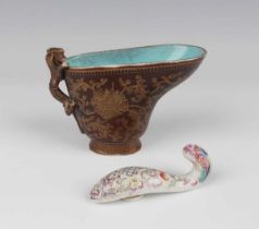 A Chinese gilt decorated brown ground porcelain libation cup, mark of Qianlong but later Qing