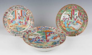 Two Chinese Canton famille rose porcelain side plates, mid-19th century, each painted with a central