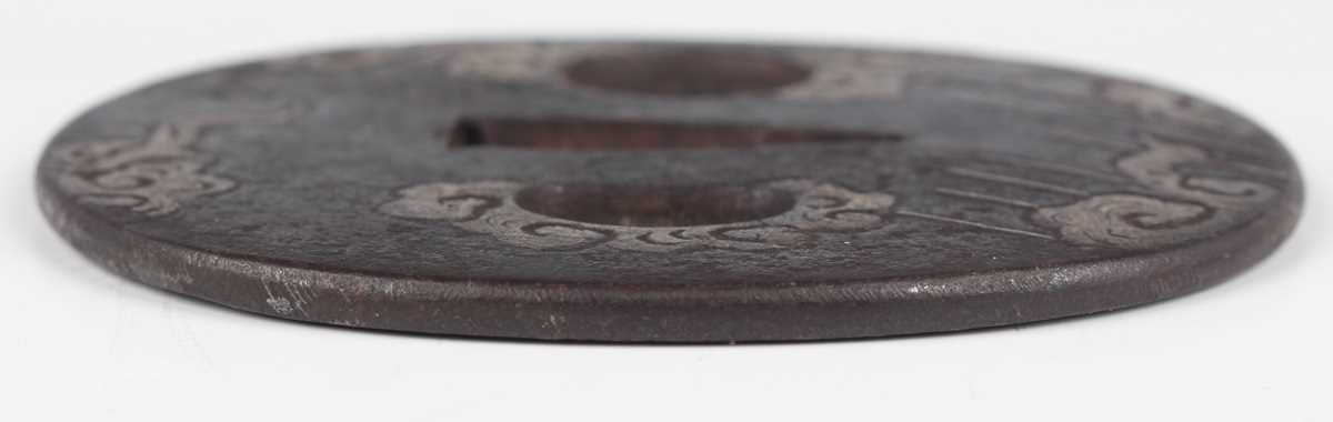 A Japanese cast iron oval tsuba, Edo period, with silver damascened dragon and vapour decoration, - Image 9 of 9