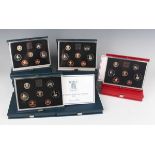 A group of eighteen Royal Mint year-type proof specimen coin sets, all cased, together with a