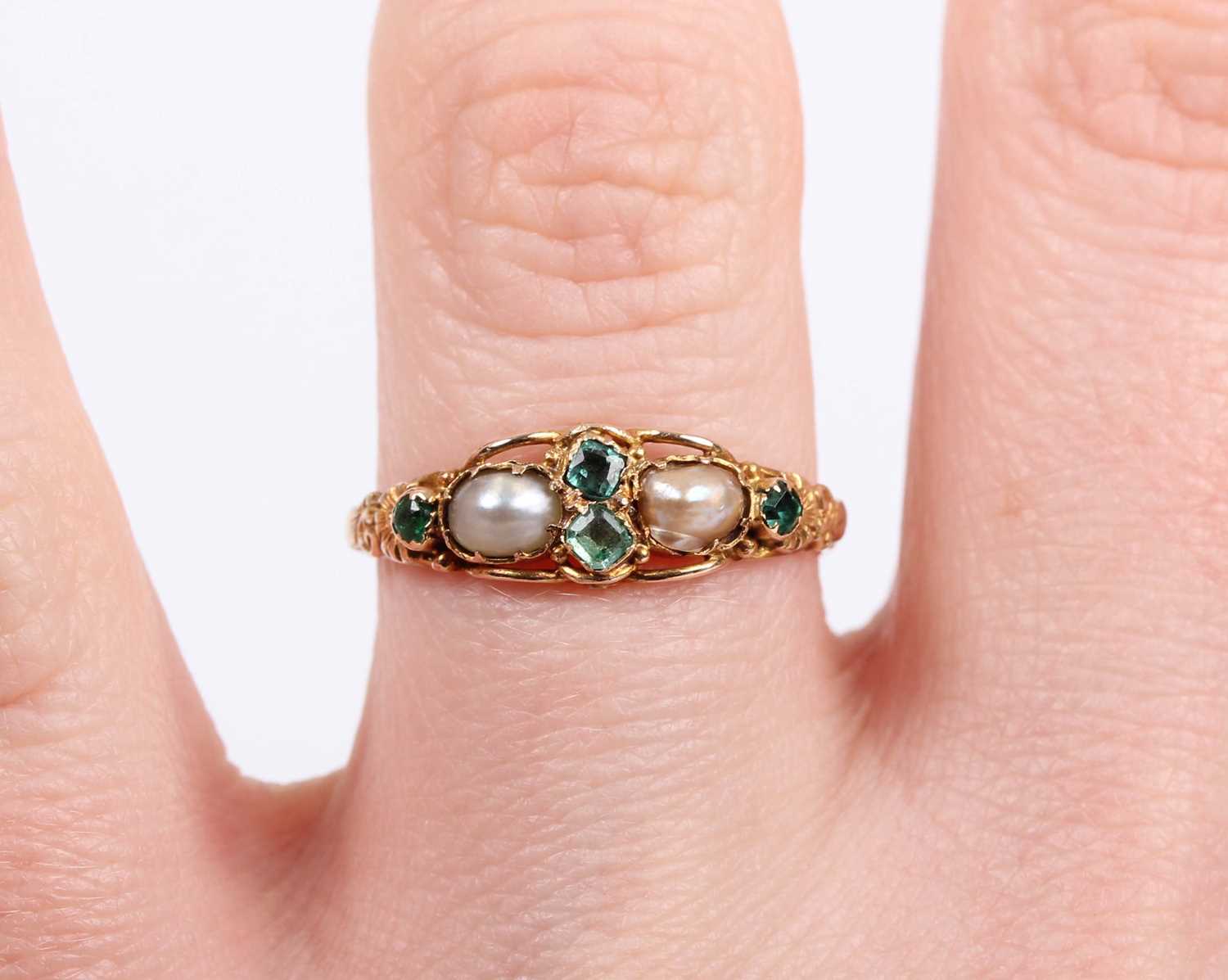 A gold, emerald, green gem and half-pearl ring, mounted with two half-pearls and four variously - Image 5 of 5