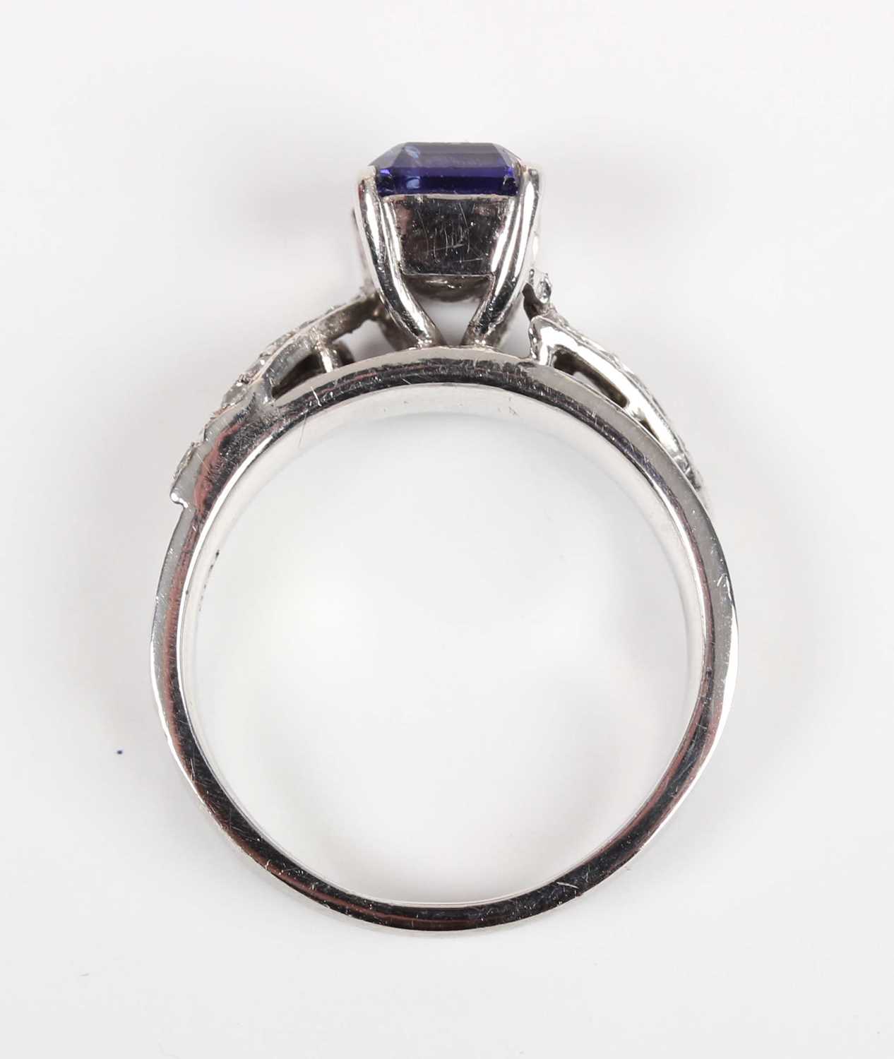 A white gold, tanzanite and diamond ring, claw set with the cut cornered rectangular tanzanite - Image 4 of 10