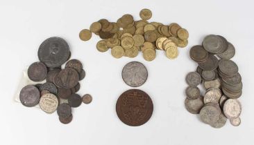 A collection of British and world coins, tokens and other paranumismatic items, including a group of