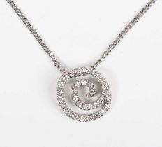 An 18ct white gold and diamond pendant in a coiled design, mounted with a circular cut diamond,